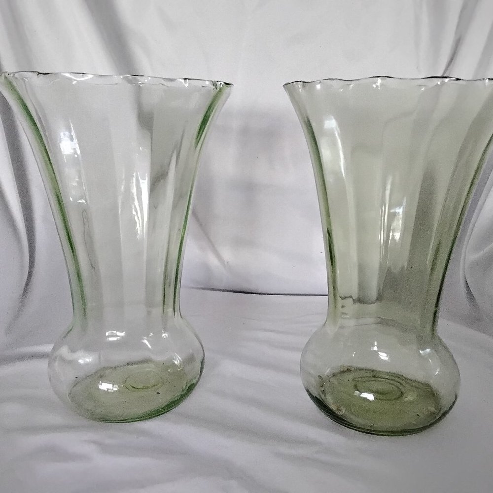 Matching green depression glass fluted vases